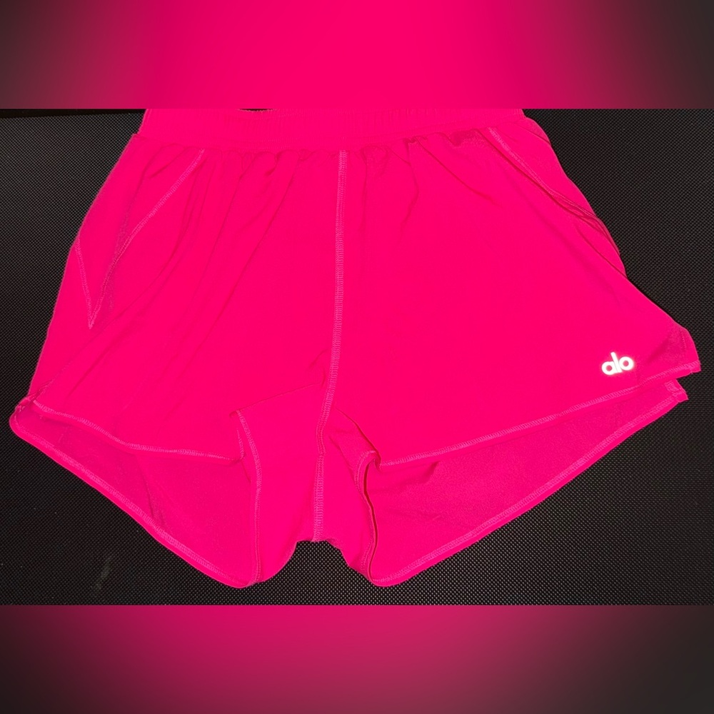 Pink alo stride shorts